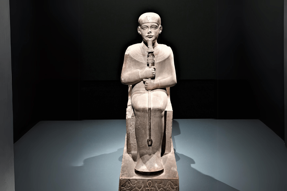 Ancient statue of God Ptah in Egypt Tours Group