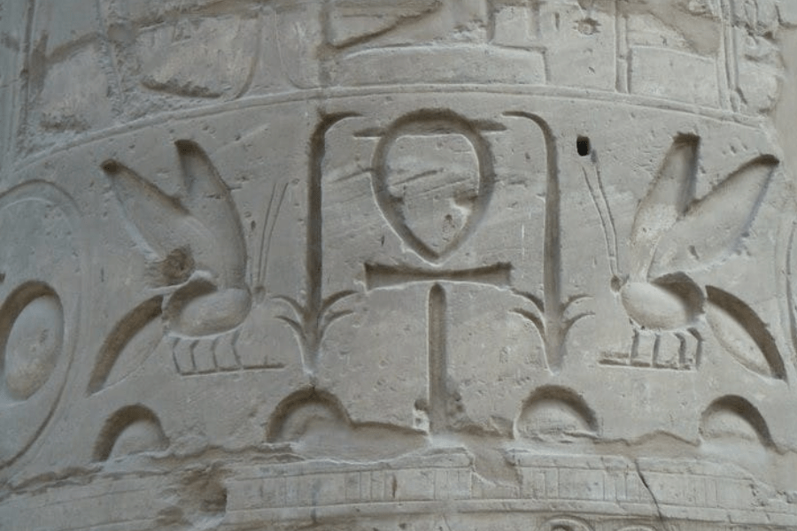 Ankh symbol carved in ancient Egyptian antiquities.