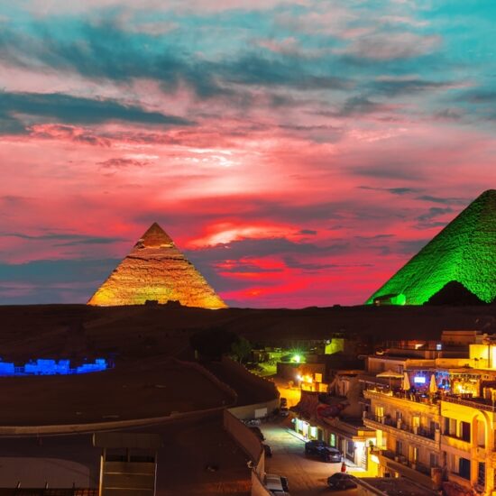 Giza Pyramids illuminated during the Sound & Light Show - 13 Days Egypt Holiday