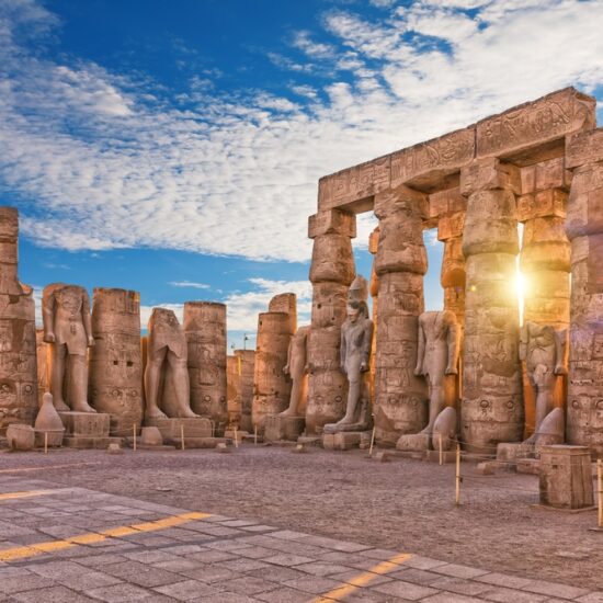 Illuminated Luxor Temple at dusk - 13 Days Egypt Holiday: Cairo, Alexandria, Siwa, Abu Simbel & Luxor