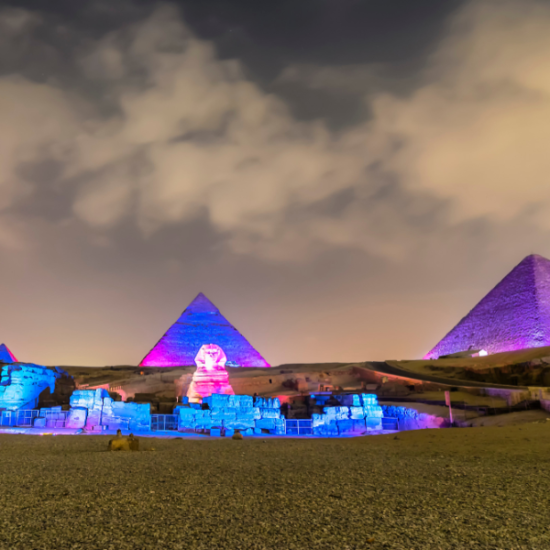 Pyramids Sound & Light Show illuminating the Giza Plateau at night - 16 Days Cairo, Nile Cruise, Hurghada & Siwa Tour Package