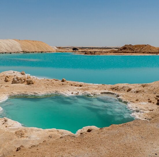 Crystal-clear Salt Lakes surrounded by palm trees in Siwa - 13 Days Cairo, Alexandria, Siwa, Abu Simbel and Luxor