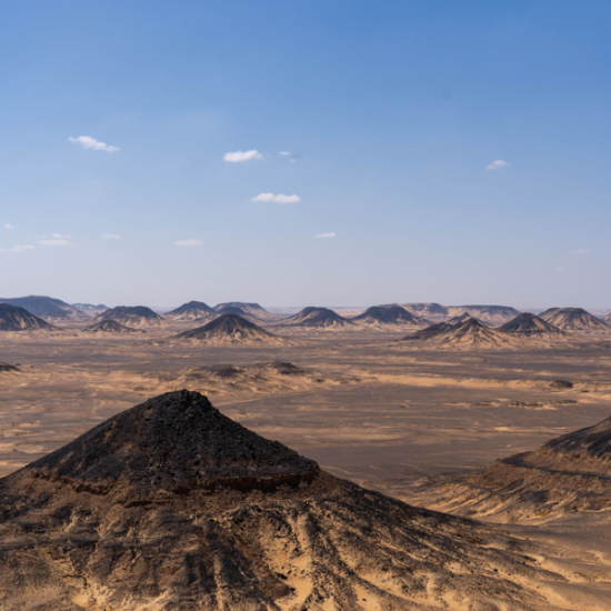 Scenic view of the Black Desert in Egypt - 10 Days Cairo, Nile Cruise, Bahariya Oasis & White Desert Tour