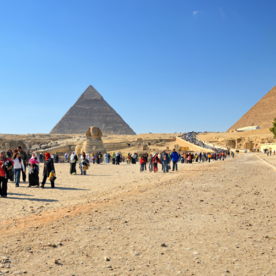 The Great Pyramids of Giza under a clear sky.
