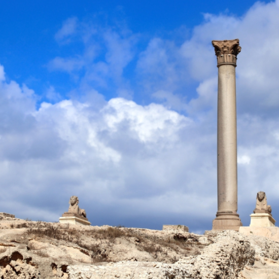 Pompey's Pillar, a towering Roman column in Alexandria, Egypt - 14 Days Egypt Tour Package – Cairo, Luxor, Hurghada, Oasis and Alexandria