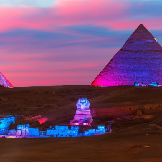 Giza Pyramids illuminated during the Sound and Light Show - 14 Days Cairo, Luxor, Aswan, Hurghada, Bahariya Oasis & Alexandria tour