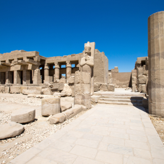 Ancient Karnak Temple in Luxor, Egypt, showcasing grand columns and intricate carvings.