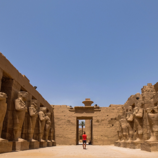 Majestic Karnak Temple in Luxor, Egypt, showcasing towering columns and intricate hieroglyphics.