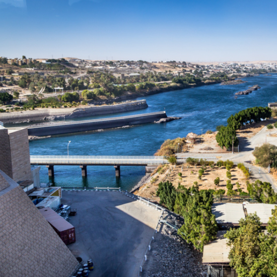 The High Dam in Aswan, Egypt, controlling the flow of the Nile River with massive engineering.