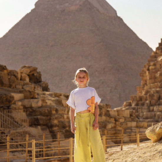 Giza pyramids with the Sphinx under blue sky