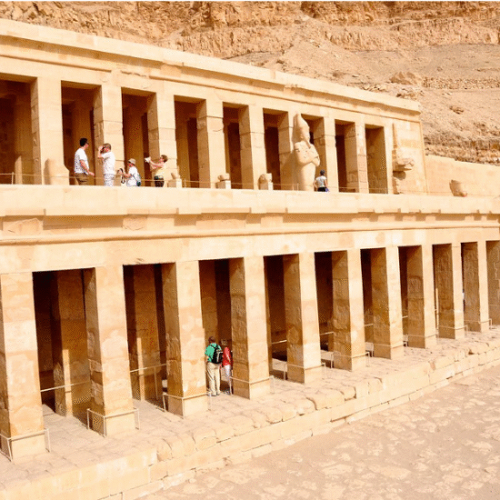 Morning sun lighting the terraces of Hatshepsut Temple against the cliffs of Deir el-Bahari