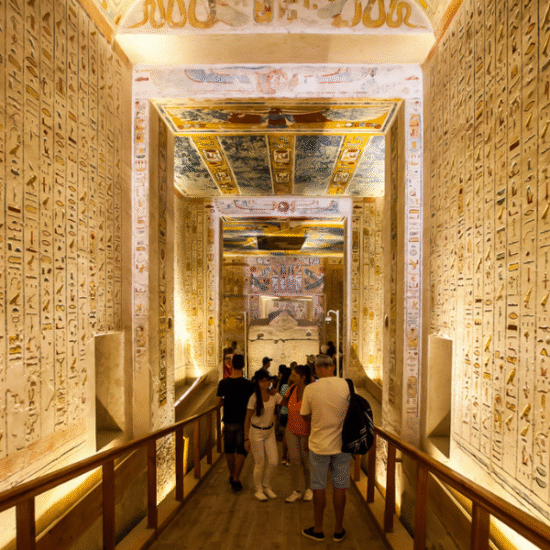 Sunrise over the Valley of the Kings with tomb entrances set in the golden desert hills