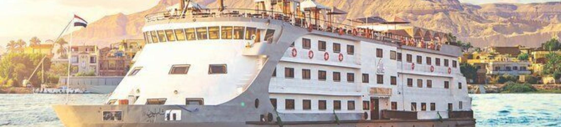 Nile Cruise Cairo Egypt luxury river cruise offering scenic views of ancient landmarks along the Nile.