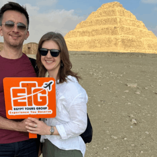 Couple standing in front of the Step Pyramid of Saqqara during a private Egypt tour.