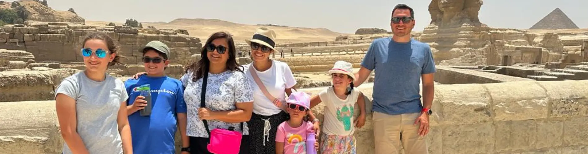 Family visiting the Pyramids of Giza, Cairo Egypt